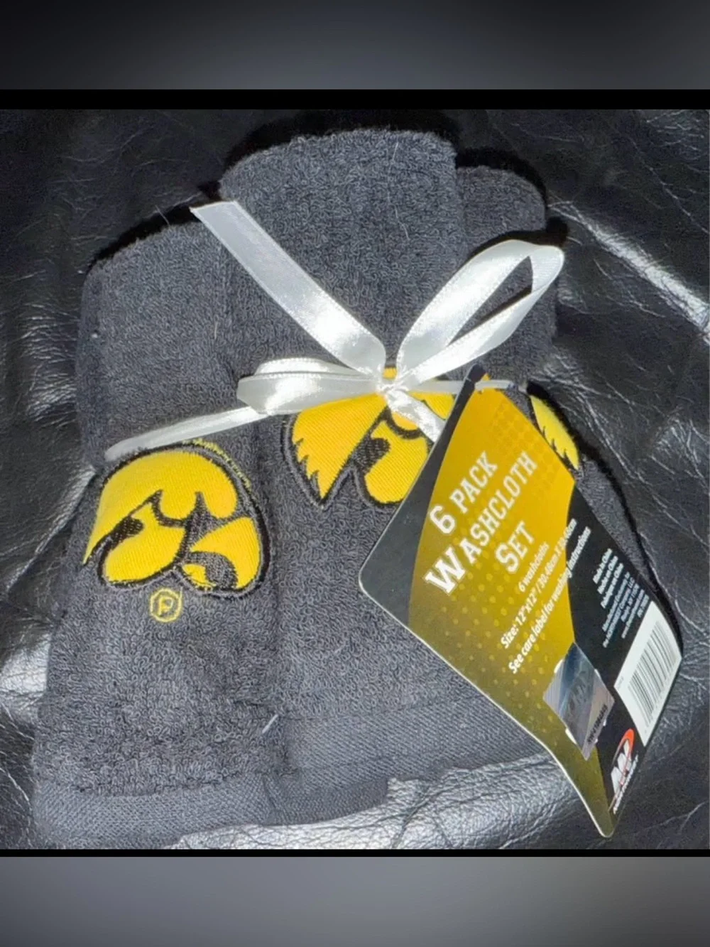 Iowa Hawkeye bath towels, wash cloths, and shower curtain rings - all new.